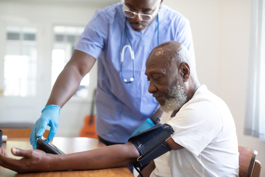 a-doctor-checking-a-patients-blood-pressure-dcbo4nt4mre